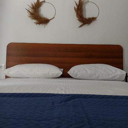 New Era Apartment Polychrono Luaran gambar
